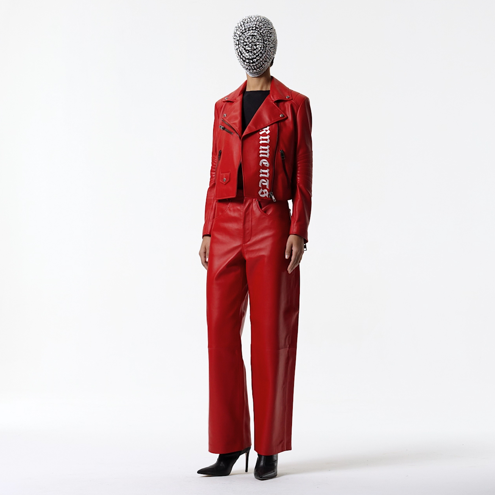 E-commerce photography for G Fashion. Woman wearing red leather trousers and jacket