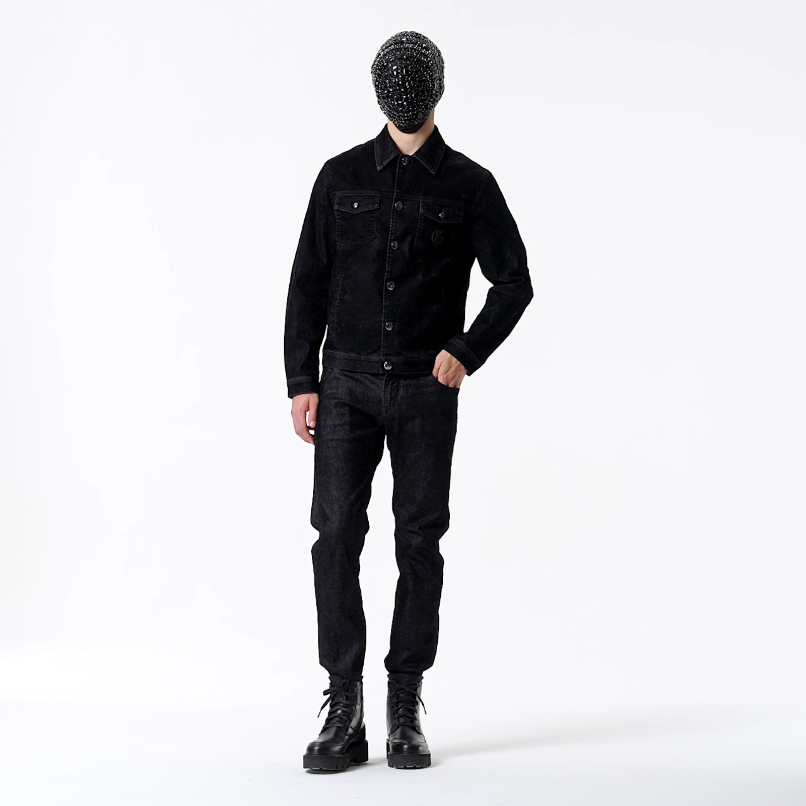 E-commerce photography for G Fashion. Man wearing black denim trousers and jacket